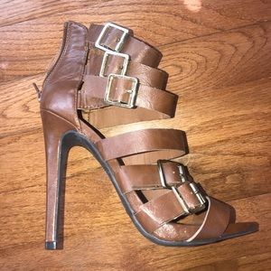 Brown and gold heels